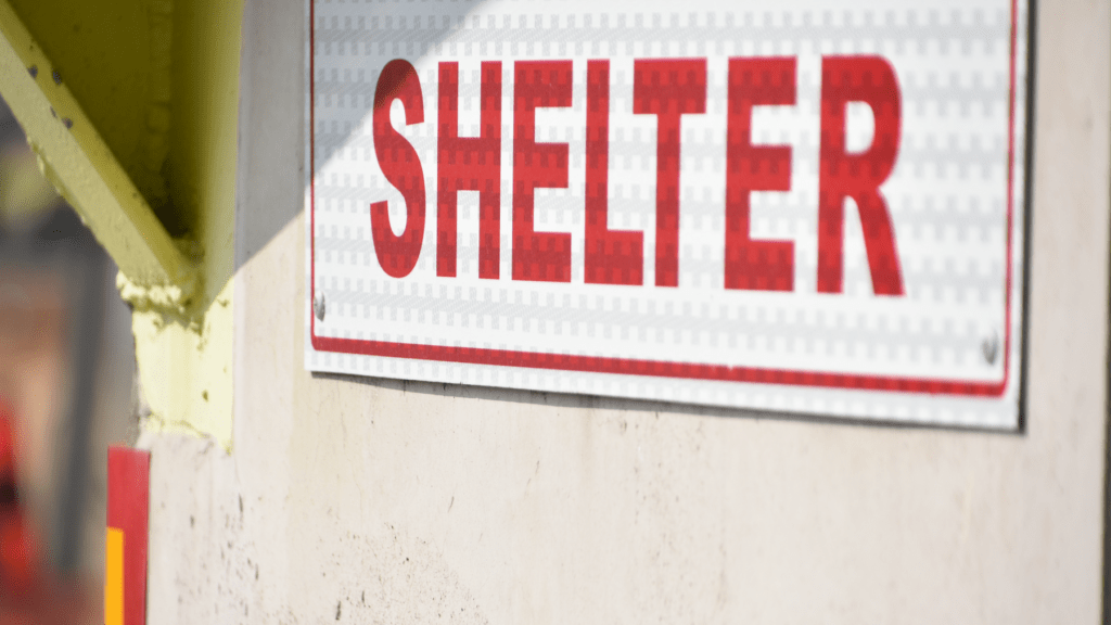 Photo of a sign that says "shelter"