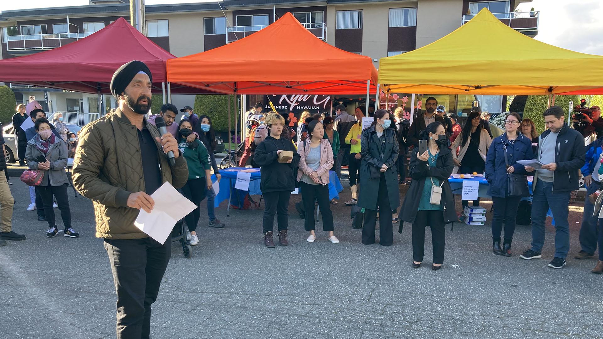 Image of Dr. Baldev Sanghera speaking to a crowd at BC Family Doctor Day 2022.